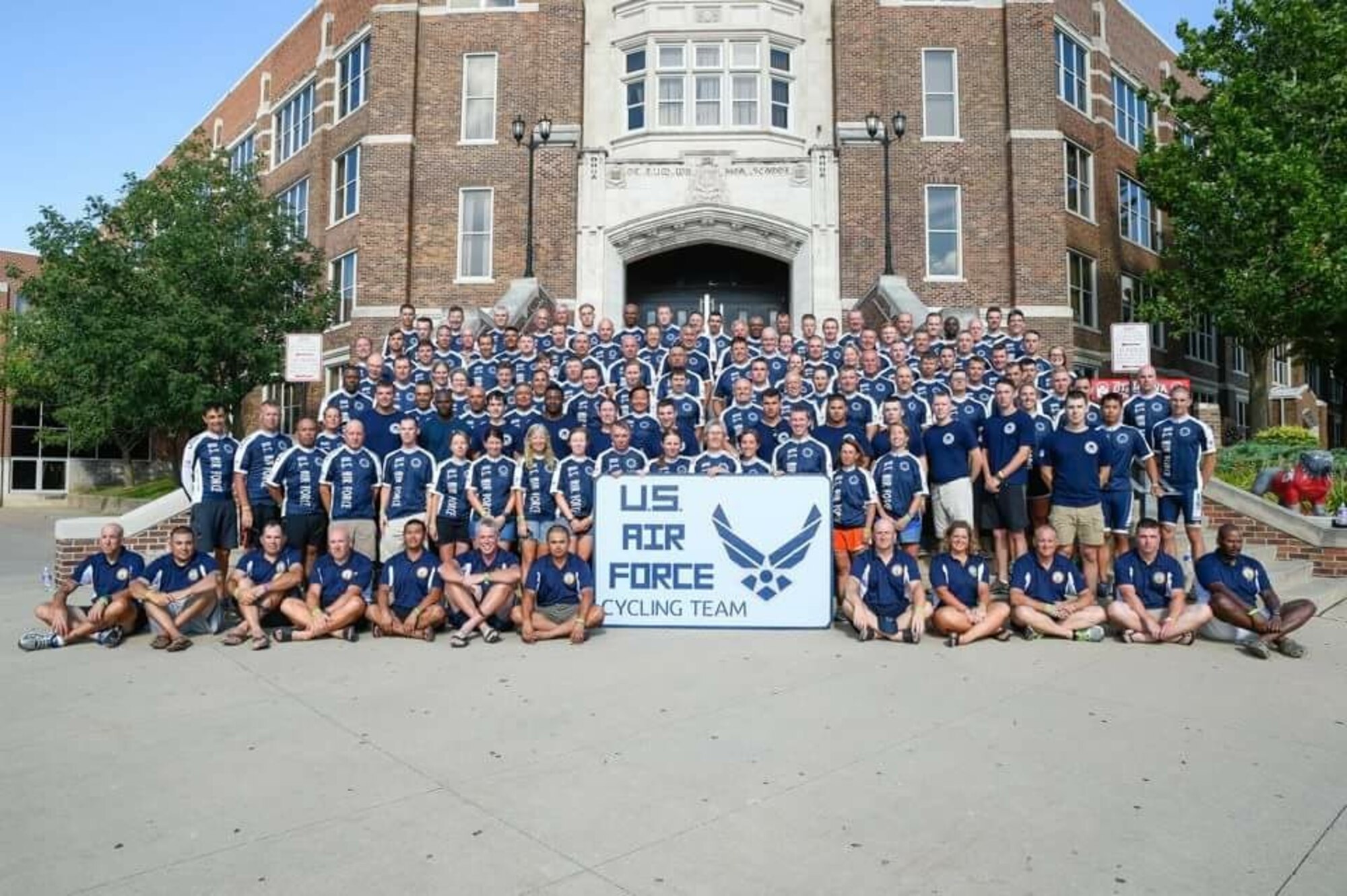 U.S. Air Force Tech. Sgt. Joshua Johnson, 100th Operations Support Squadron NCO in charge of Airfield Management training, poses for a photograph with his team following a cycling event July 24, 2016, in Iowa. The large cycle ride was a week long, and had around 130 riders from the Air Force. (Courtesy photo)