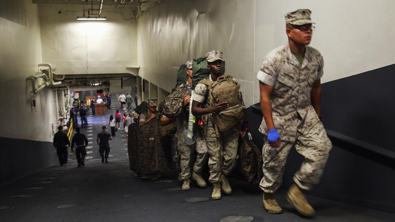 Marines with Task Force Los Angeles board the USS America at Naval Base San Diego, Calif., Aug. 29, 2016. The ship will carry Marines, sailors and Coast Guardsmen to Los Angeles Fleet Week, Sept. 2 – Sept. 5. Fleet Weeks are annual patriotic events where active Navy and Coast Guard ships dock in major U.S. cities giving Marines, Sailors and Coast Guardsmen an opportunity to interact with locals. This is the first year L.A. has hosted an official Fleet Week event.