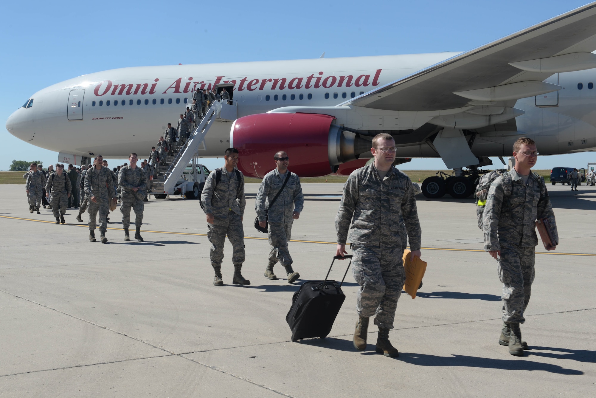 Airmen return home from a six-month deployment at Minot Air Force Base, N.D., Aug. 29, 2016. Airmen will soon undergo reintegration to ease back into their work and family life. (U.S. Air Force Photo/Airman 1st Class Jessica Weissman)