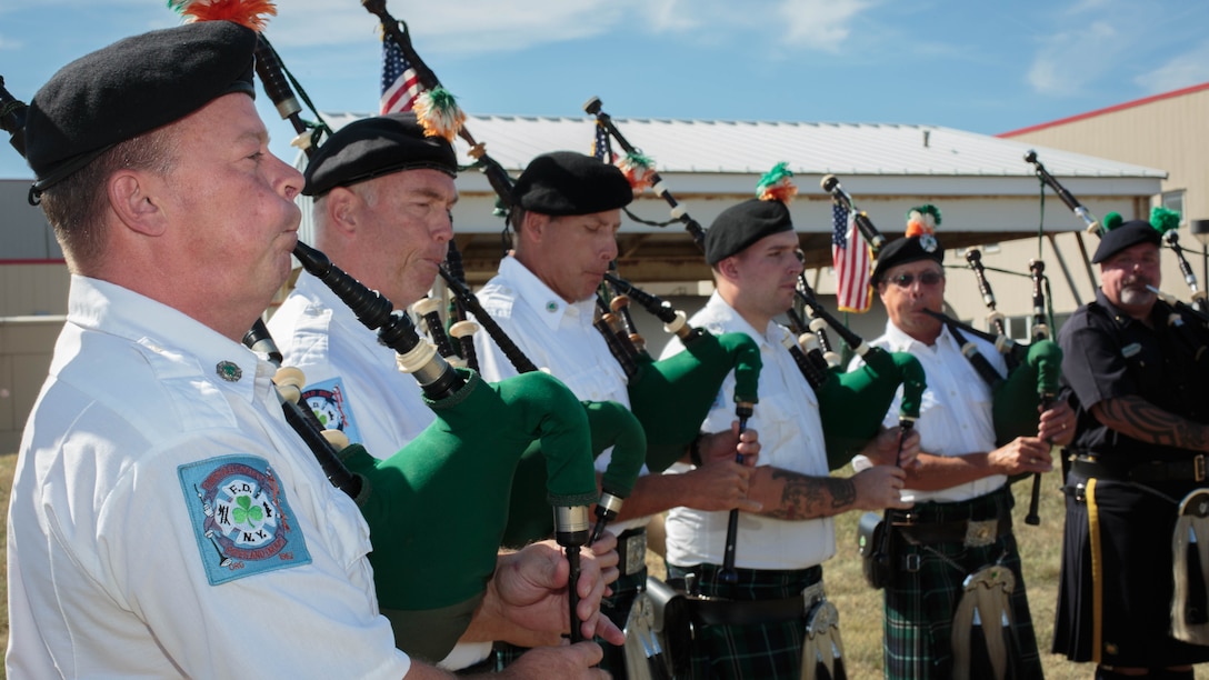 Members of the New York Police Department Emerald Society perform the Marines’ Hymn during a remembrance ceremony for two Reserve Marines from Brooklyn’s 6th Communication Battalion at Floyd Bennett Field, Aug. 30, 2016. Sgt. Maj. Michael S. Curtin and Gunnery Sgt. Matthew D. Garvey, first responders with the city’s police fire departments, lost their lives at the World Trade Center on 9/11. To honor their memory, Marine Corps Reserve Center Brooklyn dedicated the Curtin Garvey Complex and a 9/11 monument made partially with steel from the World Trade Center. The remembrance ceremony is being held in conjunction with the U.S. Marine Corps Reserve Centennial, celebrating 100 years of service and selfless dedication to the nation. 