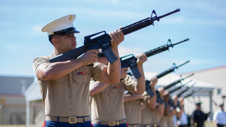 A rifle detail from Brooklyn’s 6th Communication Battalion fire three rifle volleys during a remembrance ceremony for two Reserve Marines from their unit at Floyd Bennett Field, Aug. 30, 2016. Sgt. Maj. Michael S. Curtin and Gunnery Sgt. Matthew D. Garvey, first responders with the city’s police fire departments, lost their lives at the World Trade Center on 9/11. To honor their memory, Marine Corps Reserve Center Brooklyn dedicated the Curtin Garvey Complex and a 9/11 monument made partially with steel from the World Trade Center. The remembrance ceremony is being held in conjunction with the U.S. Marine Corps Reserve Centennial, celebrating 100 years of service and selfless dedication to the nation. 