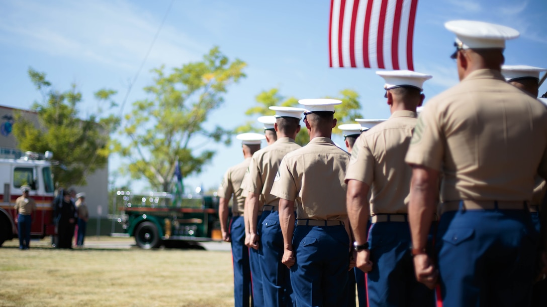 Marines from Brooklyn’s 6th Communication Battalion stand at attention during a remembrance ceremony for two Reserve Marines from their unit at Floyd Bennett Field, Aug. 30, 2016. Sgt. Maj. Michael S. Curtin and Gunnery Sgt. Matthew D. Garvey, first responders with the city’s police fire departments, lost their lives at the World Trade Center on 9/11. To honor their memory, Marine Corps Reserve Center Brooklyn dedicated the Curtin Garvey Complex and a 9/11 monument made partially with steel from the World Trade Center. The remembrance ceremony is being held in conjunction with the U.S. Marine Corps Reserve Centennial, celebrating 100 years of service and selfless dedication to the nation. 