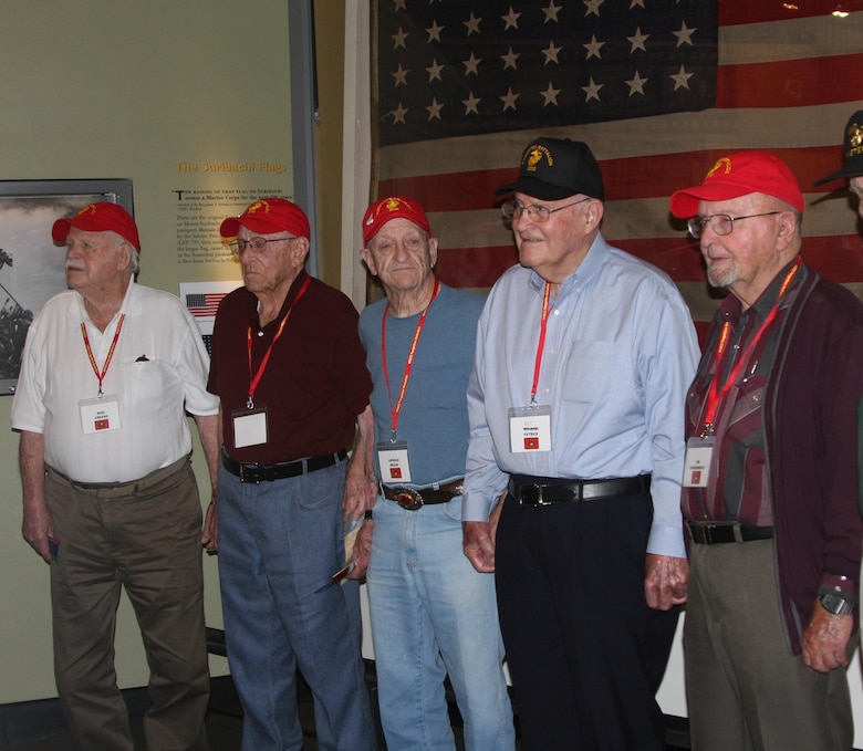 Five of the six surviving veterans of World War II's "Forgotten Battalion," as the artillerymen of H&S, G, H, and I batteries, 3rd Battalion, 10th Marines and the 2nd 155 Howitzer Battalion were collectively known, gathered at the National Museum of the Marine Corps for a reunion Aug. 25. Left to right: Mike Arrand, Earl Lance, Arnold Meads (the oldest at 96), Pat Patrick (the youngest at 91) and Jim Lieberknecht.