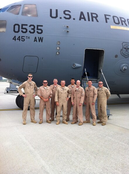 Reservists from the 89th Airlift Squadron and 445th Aircraft Maintenance Squadron flew aeromedical evacuation missions downrange to Southwest Asia August 24-28, 2016. The aircrew transported wounded warriors back from the area of operation to medical facilities at both Ramstein Air Base and Joint Base Andrews, Maryland. The crew consisted of (from left to right) 1st Lt. Andrew Bowman, Chief Master Sgt. Jason LeMaster, Master Sgt. Brian Dawes, Col. Craig McPike, Master Sgt. Roberto Garcia, Jr., Maj. Josh Roberts, Lt. Col. Mike Baker, Master Sgt. Spencer Fisher.