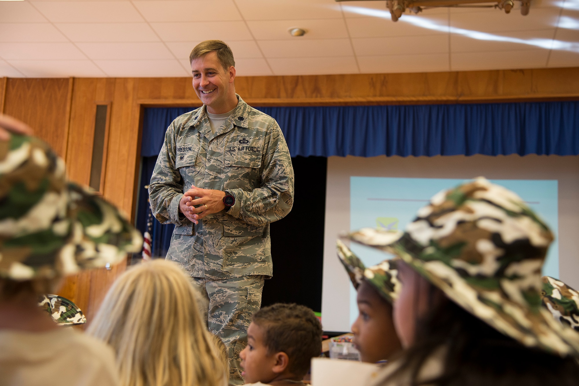 Lt. Col. John Preston, 436th Mission Support Group deputy commander, briefs a group of school -age children during the annual Kids/Teachers Understanding Deployment Operations event Aug. 23, 2016, at Dover Air Force Base, Del. The day’s events mirrored the stages of an actual deployment to help children of military members understand what their parents go through when they deploy.  (U.S. Air Force photo by Senior Airman Aaron J. Jenne)