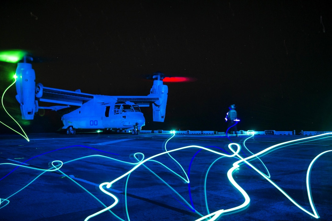 A Marine Corps MV-22 Osprey aircraft prepares for takeoff from the flight deck of the amphibious assault ship USS Boxer in the Pacific Ocean, Aug. 26, 2016. Navy photo by Petty Officer 3rd Class Michael T. Eckelbecker