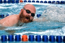 Colin Kearns, Missile Defense Agency, completes a lap during the 12th annual Schriever Air Force Base Triathlon at Schriever Air Force Base, Colorado, Friday, Aug. 26, 2016. The 400-meter swim was followed by a 12-mile bike ride and 3.1-mile run. (U.S. Air Force photo/Dennis Rogers)