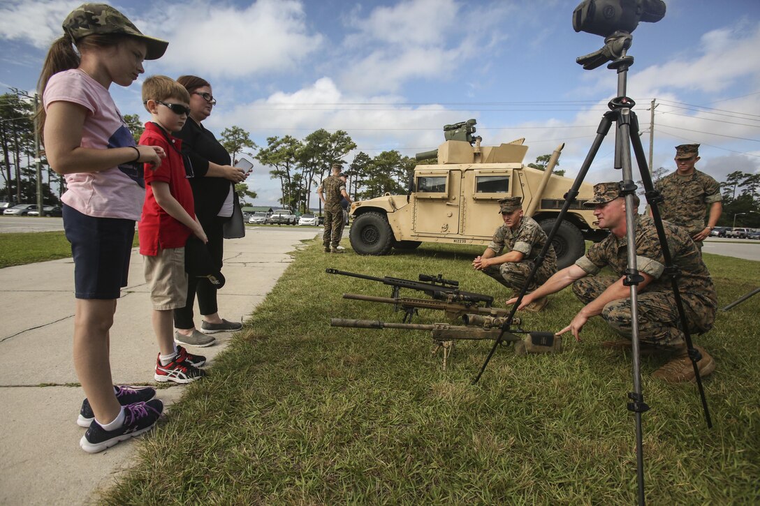 Marines with 2nd Battalion, 6th Marine Regiment, 2nd Marine Division present a static display of different equipment their unit uses in their training and at Camp Lejeune, N.C., Aug. 29, 2016. The Marines presented the gear to a reunion of 1st Battalion, 6th Marine Regiment veterans and their families to show them the change and progression of today’s gear. (U.S. Marine Corps photo by Lance Cpl. Miranda Faughn)