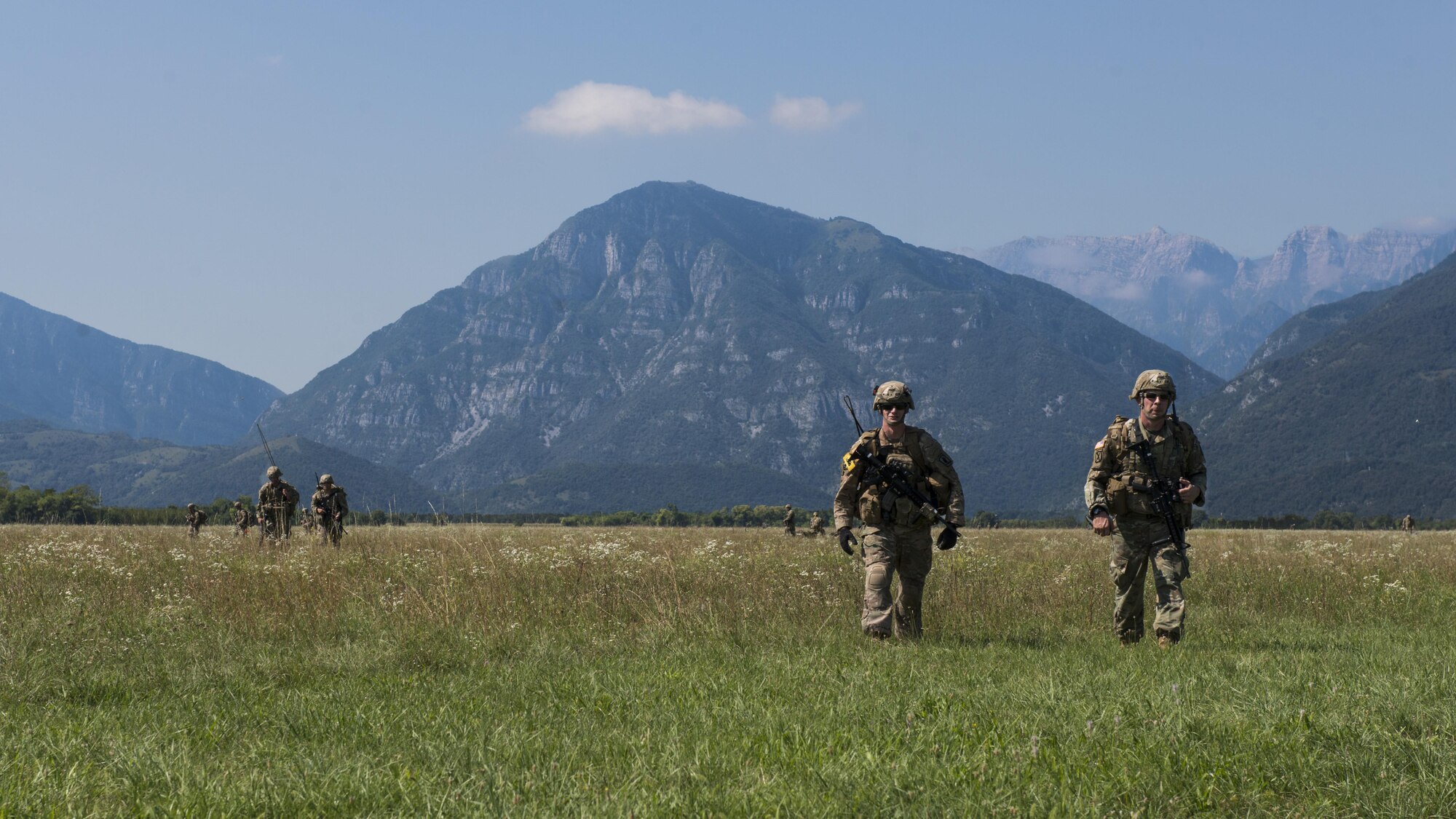 U.S. Army 173rd Airborne Brigade paratroopers participate in a joint airborne operation near Aviano Air Base, Italy, Aug. 25, 2016. The paratroopers practiced airfield clearance techniques after completing a jump with the German Army 1st Airborne Brigade. (U.S. Air Force photo by Senior Airman Krystal Ardrey/Released)