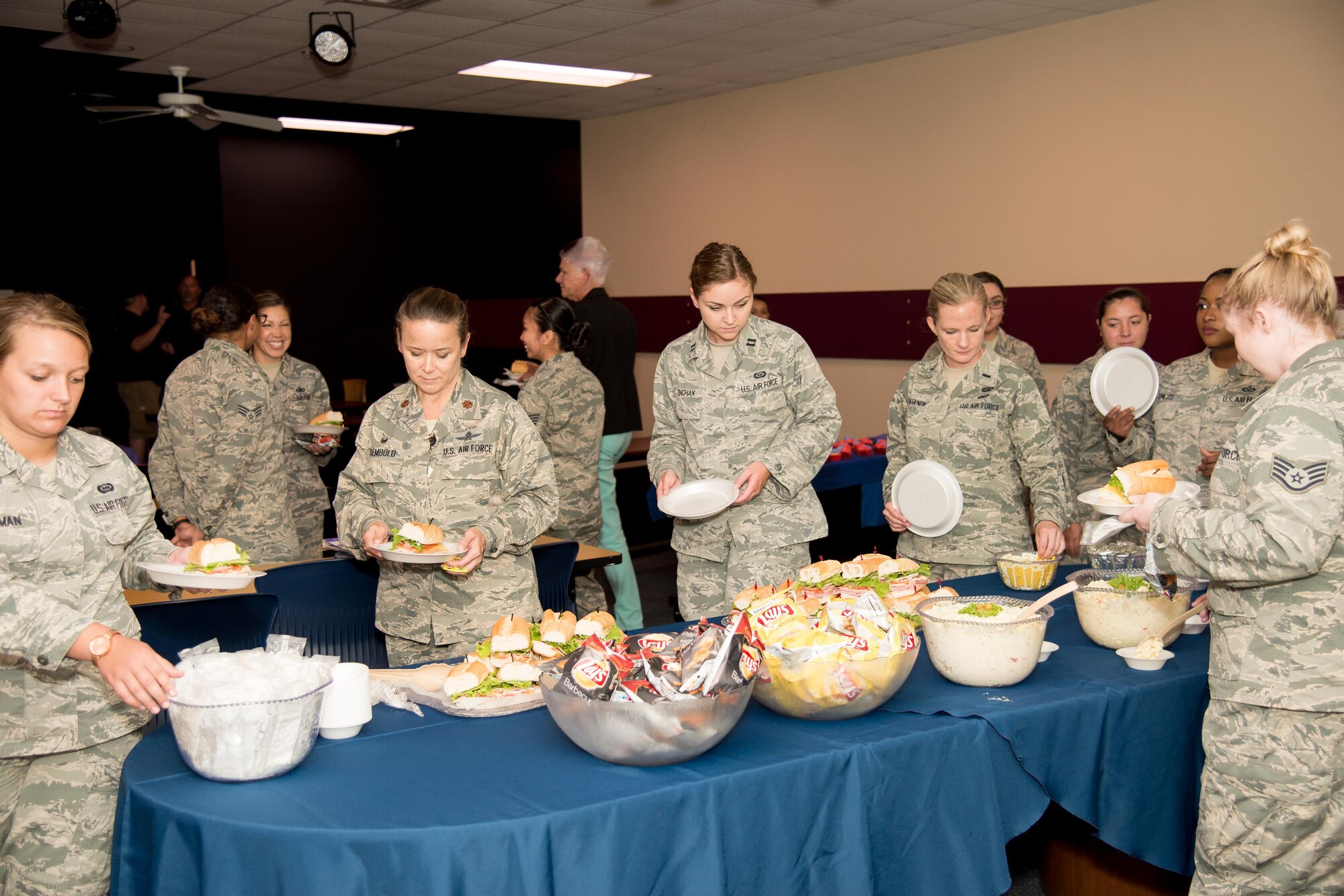 Attendees of the Women's Equality Day luncheon enjoy refreshments Aug. 25, 2016, at Dover Air Force Base, Del. The gathering celebrated the 96-year anniversary of the ratification of the 19th Amendment to the U.S. Constitution, allowing women to vote. (U.S. Air Force photo by Mauricio Campino)