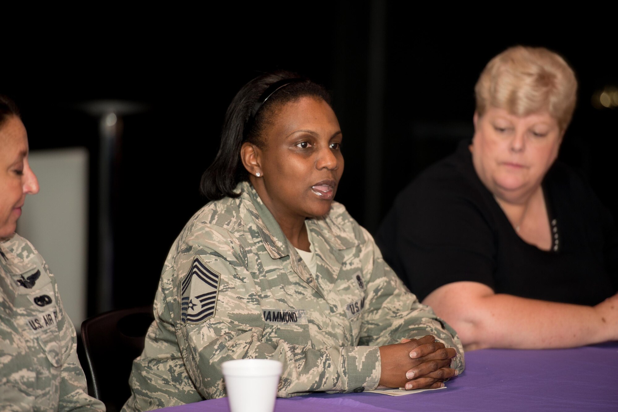 Members of the speaking panel at the Women's Equality Day luncheon discuss their personal experiences in the military Aug. 25, 2016, at Dover Air Force Base, Del. The gathering included a speaking panel of active duty and retired female veterans. (U.S. Air Force photo by Mauricio Campino)