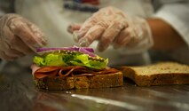 Airman 1st Class Tiffany Cristo, 92nd Force Support Squadron food services apprentice, makes a sandwich in the flight kitchen, Aug. 24, 2016, at Fairchild Air Force Base. Flight kitchens vary base to base. The Fairchild flight kitchen is attached to the Warrior Dining Facility, but at some bases, the flight kitchen can be found on the runway for convenience. Some bases have their flight kitchen program consolidated.  (U.S. Air Force photo/Airman 1st Class Sean Campbell)