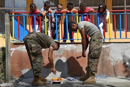 U.S. Army Staff Sgt. Dorian Pekarcik (left) and Staff Sgt. Gerald Francis (right), both with the 457th Civil Affairs Battalion, assist with the kindergarten renovation during a Humanitarian Civil Assistance project, Kalifarevo, Bulgaria, Aug. 25, 2016. As a part of the European Command’s (EUCOM) Humanitarian a Civic Assistance Program, the U.S. Army Reserve 457th Civil Affairs Battalion, the 375th Engineer Company, U.S. Air Force National Guard 164th Civil Engineer Squadron and the Bulgarian Army collaborate to renovate a kindergarten. (U.S. Army photo by Spc. Nathanael Mercado)