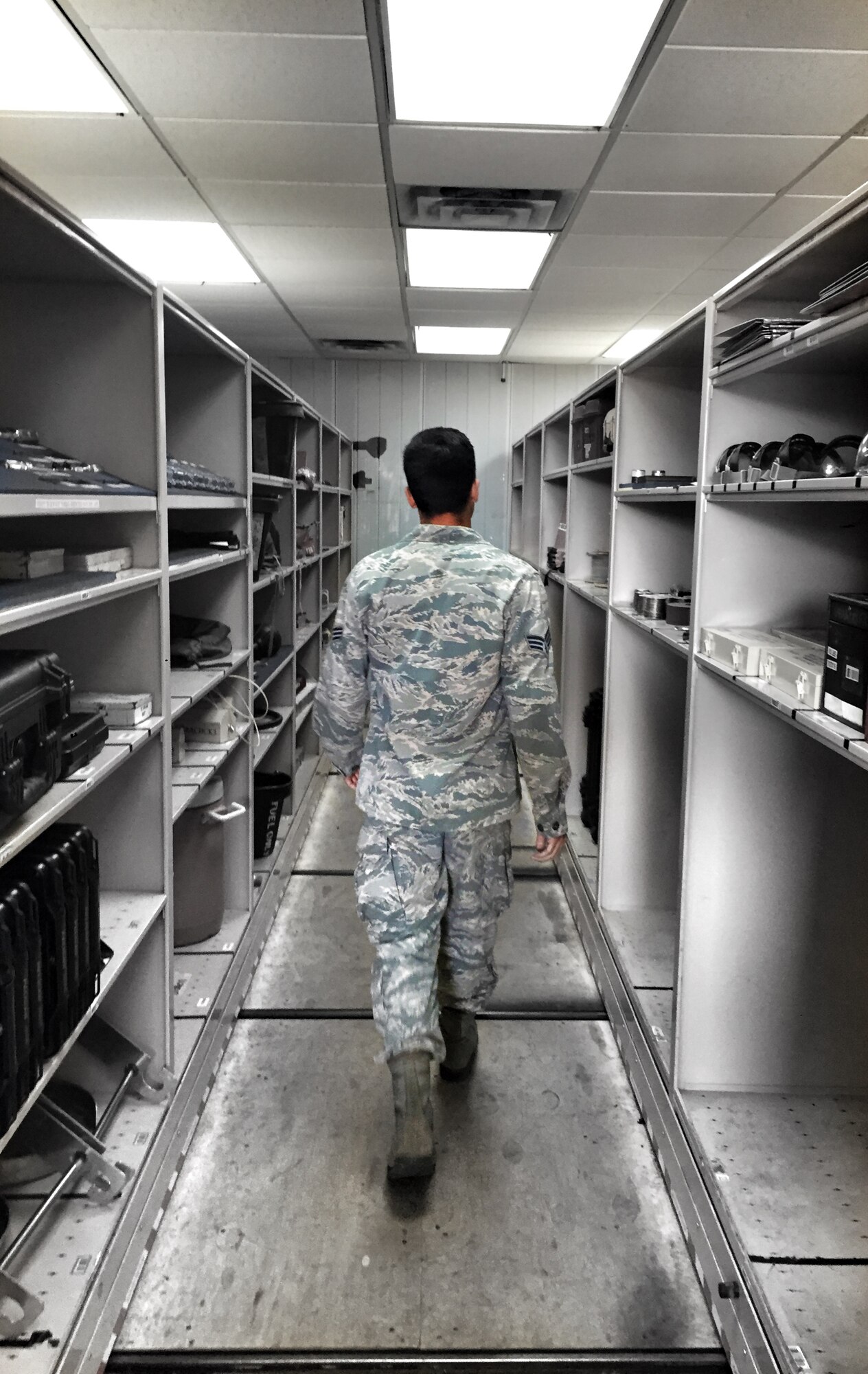 Senior Airman Josh Lemley, 507th Aircraft Maintenance Squadron locates equipment to assist with KC-135 maintenance on Aug. 10, 2016 at Tinker Air Force Base, Oklahoma. (U.S. Air Force Photo/Staff Sgt. Brian Abion)