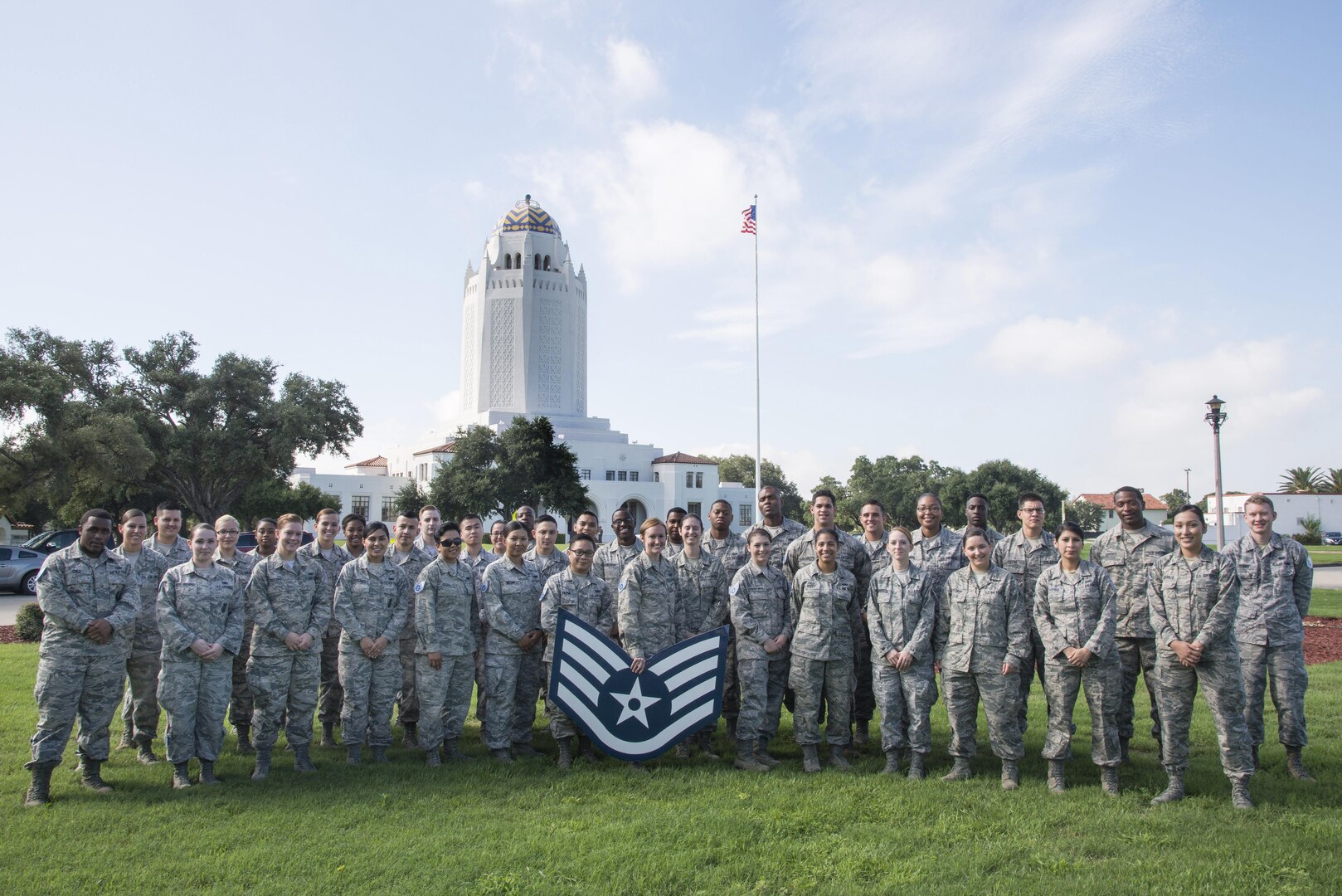 Joint Base San Antonio-Randolph staff sergeant selectees gather in front of the "Taj" for a group photo after being notified of their selection Aug. 25, 2016 at JBSA-Randolph. Out of 39,064 eligible senior airmen, 16,506 were selected for promotion with a selection rate of 42.25 percent.  