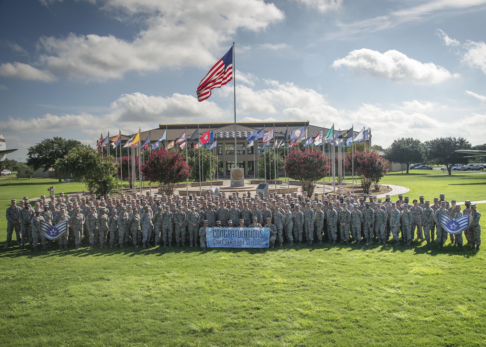 Joint Base San Antonio-Lackland staff sergeant selectees gather for a group photo after being notified of their selection Aug. 25, 2016 at JBSA-Lackland. Out of 39,064 eligible senior airmen, 16,506 were selected for promotion with a selection rate of 42.25 percent.  