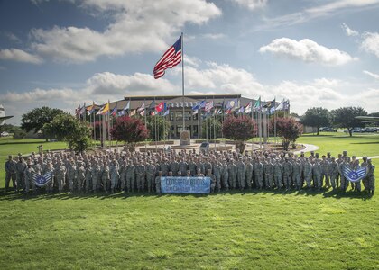 Joint Base San Antonio-Lackland staff sergeant selectees gather for a group photo after being notified of their selection Aug. 25, 2016 at JBSA-Lackland. Out of 39,064 eligible senior airmen, 16,506 were selected for promotion with a selection rate of 42.25 percent.  