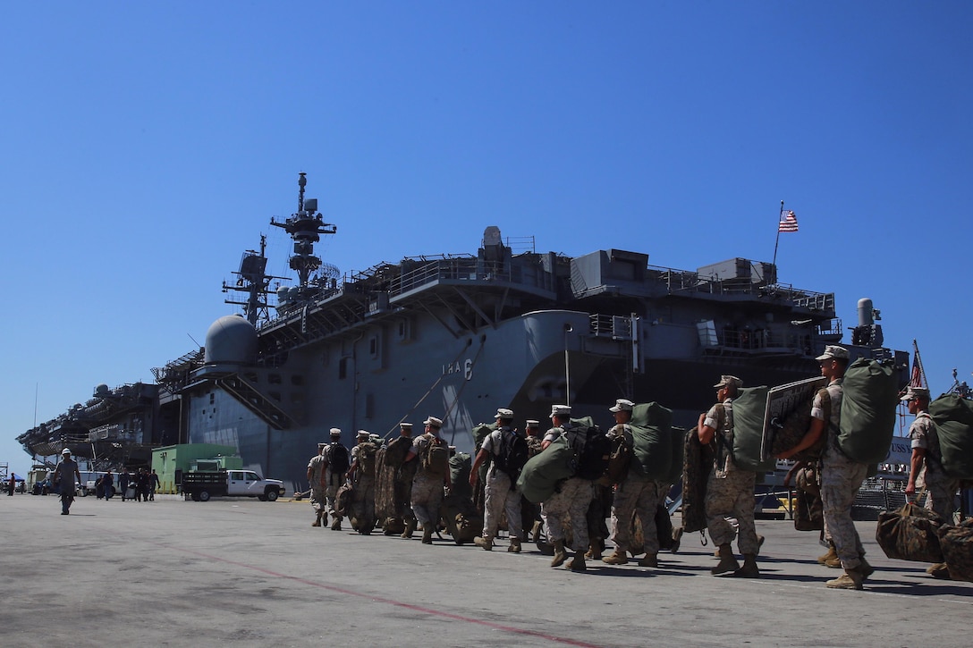 Marines with Task Force Los Angeles prepare to board the USS America at Naval Base San Diego, Calif., Aug. 29, 2016. The ship will carry Marines, sailors, and Coast Guardsmen to Los Angeles for Fleet Week, Sept. 2 – Sept. 5. Marine Corps photo by Lance Cpl. Caitlin Bevel