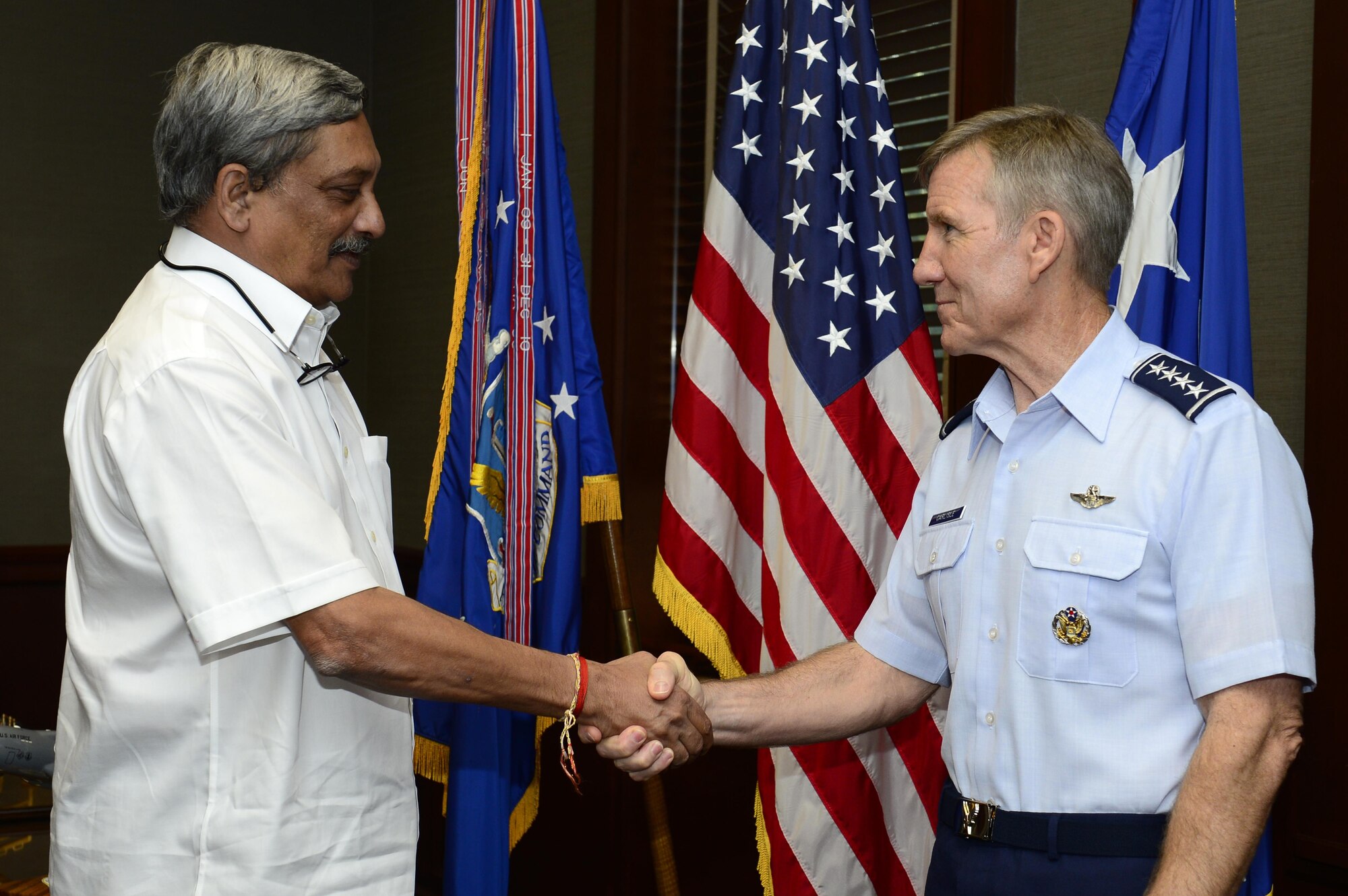 U.S. Air Force Gen. Hawk Carlisle, Air Combat Command commander, shakes hands with Indian Defense Minister Manohar Parrikar Minister, at Langley Air Force Base, Va., Aug. 30, 2016. Parrikar recently met with Defense Secretary Ash Carter for a joint news conference at the Department of Defense.. (U.S. Air Force photo by Airman 1st Class Kaylee Dubois)
