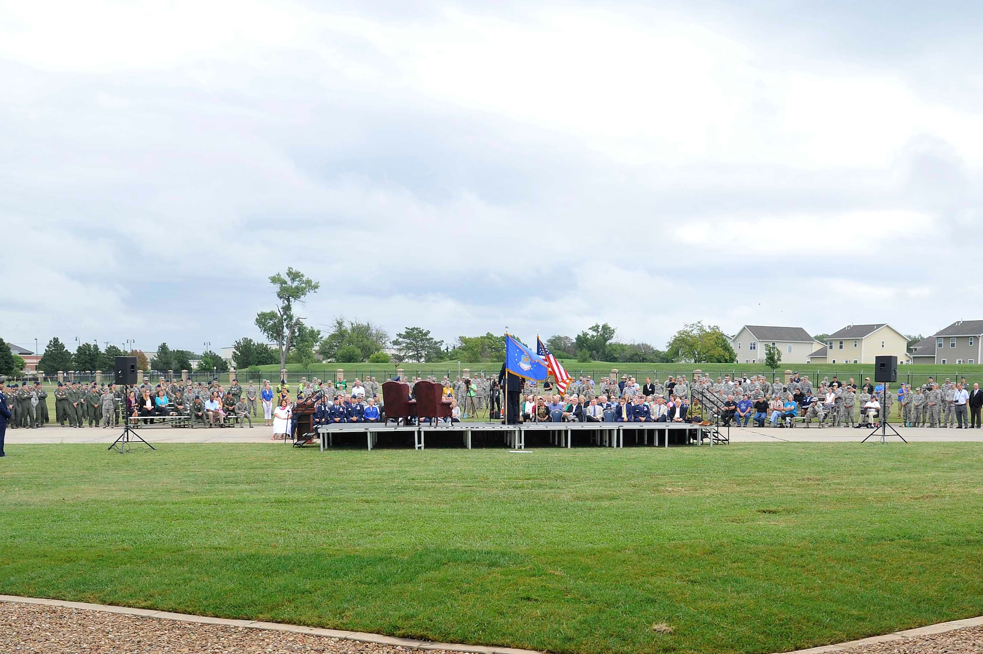 Members of Team McConnell, the local community and the tanker community listen to Gen. Stephen R. Lorenz, retired Air Education Training Command commander and KC-135 pilot, speak during the KC-135 60th Anniversary Ceremony, Aug. 31, 2016, at McConnell Air Force Base, Kan. Lorenz spoke about the history of aerial refueling and the pivotal role the KC-135 has had in projecting airpower during the last 60 years. (U.S. Air Force photo/Airman Erin McClellan)