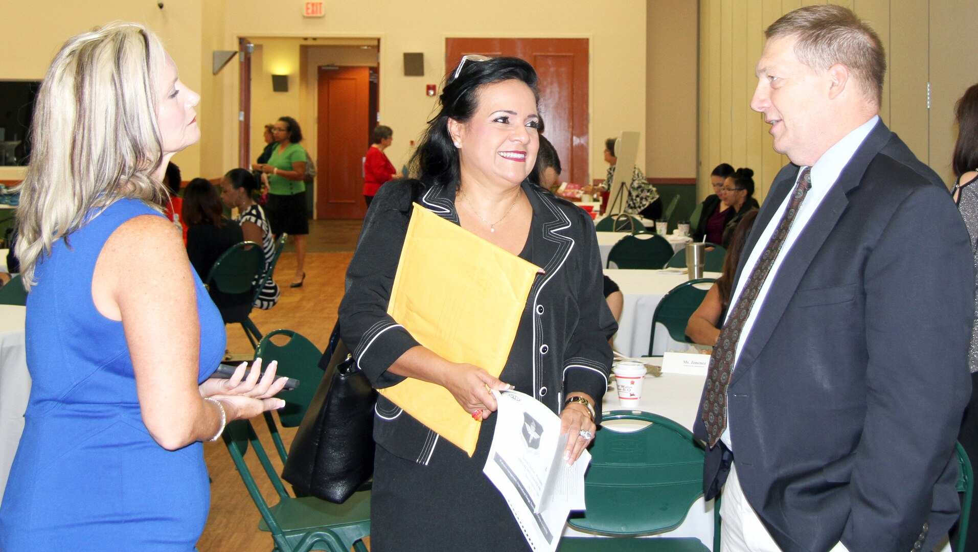 Robert Naething (right) talks with keynote speaker Sonia Clayton (center) and Alamo Federal Executive Board executive director Lisa Alonzo (left) before the start of the Alamo Federal Executive Board’s Partners in Equality Training Conference at the Schertz Civic Center Aug. 17. Naething is the deputy to the U.S. Army North commanding general.