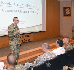 Brooke Army Medical Center Commander Brig. Gen. Jeffrey Johnson addresses staff members Aug. 24 during a town hall meeting to provide his feedback and actions based on the results of the recent Command Climate Survey.
