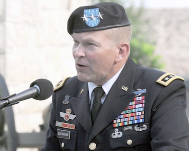 Lt. Gen. Jeffrey S. Buchanan addresses U.S. Army North military members, family, friends and distinguished guests after assuming command of ARNORTH during the change of command ceremony at the Fort Sam Houston Quadrangle Friday. 