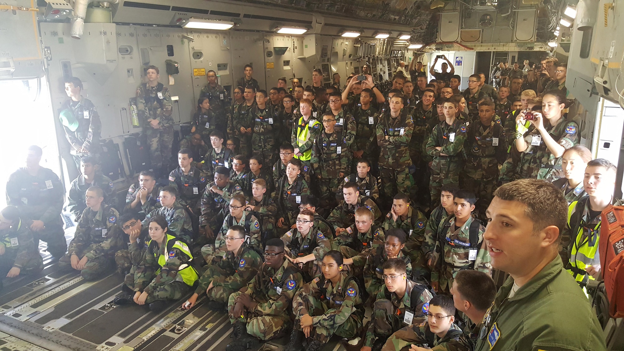 Reserve aircrew with the 732nd Airlift Squadron give civil air patrol cadets a tour of the C-17 Globemaster III during a week-long summer encampment held in August. More than 120 cadets participated in the 2016 encampment annually hosted at Joint Base McGuire-Dix-Lakehurst, N.J. (U.S. Air Force photo/Master Sgt. Donna T. Jeffries)