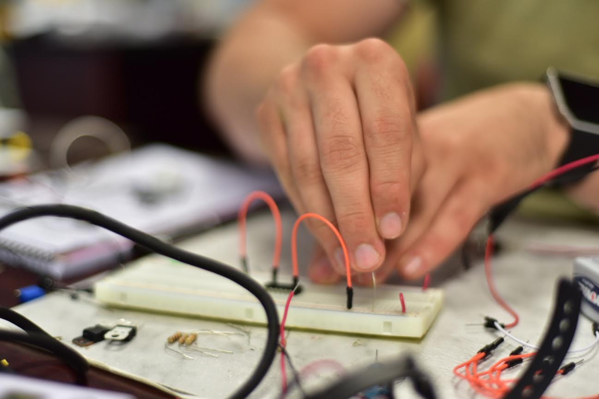 A 914th Civil Engineer member demonstrates hot to create and improvised explosive device at a training on base, August 11, 2016. The week-long training was held to teach members how to identify and dismantle IEDs. (U.S. Air Force photo by Staff Sgt. Richard Mekkri/released)