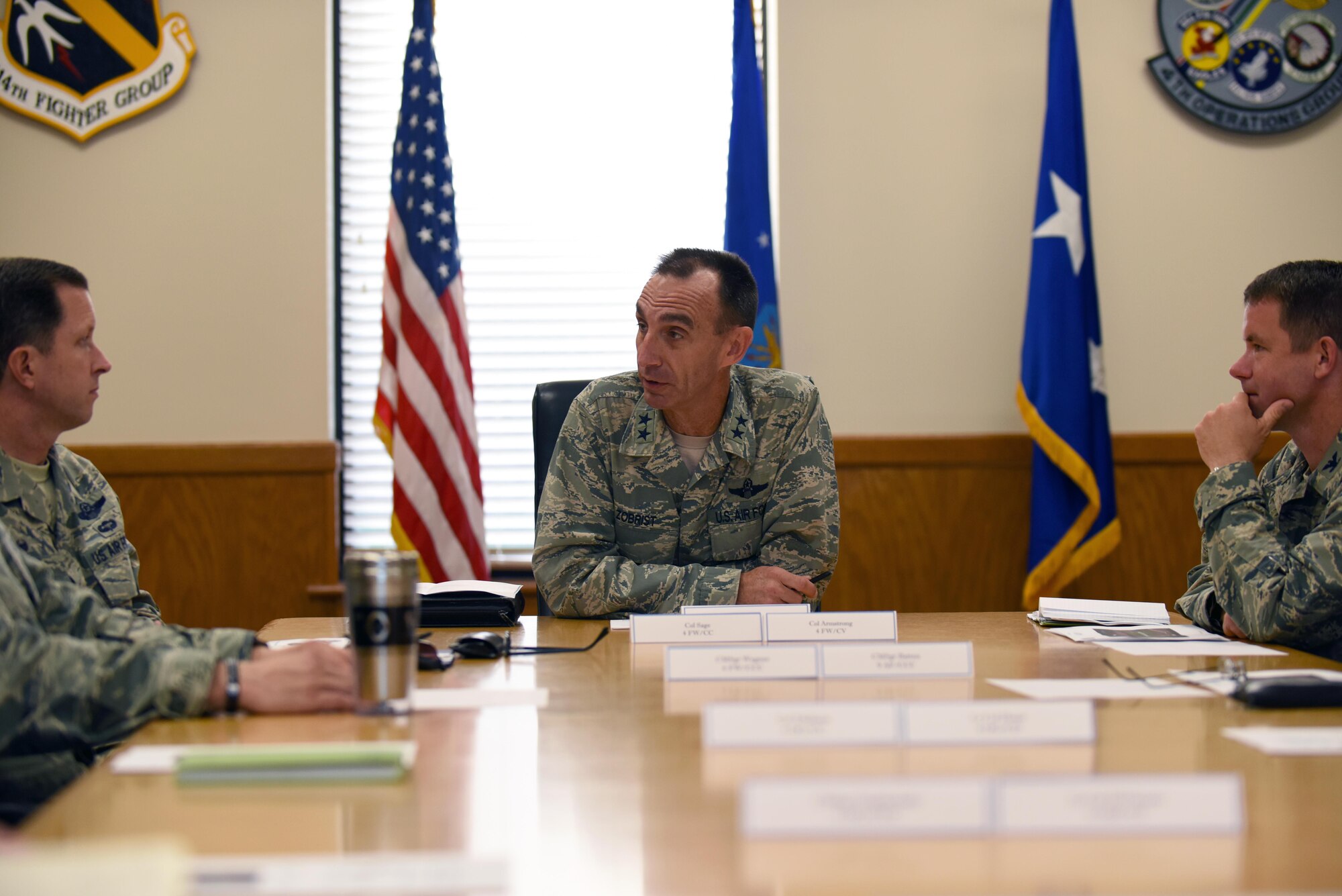 Maj. Gen. Scott Zobrist (center), Ninth Air Force commander, Col. Christopher Sage (left), 4th Fighter Wing commander, and Col. Brian Armstrong (right), 4th FW vice commander, discuss Exercise Razor Talon during an immersion tour, Aug. 23, 2016, at Seymour Johnson Air Force Base, North Carolina. Razor Talon is a joint-force training mission that takes place in the East Coast battlespace. (U.S. Air Force photo by Airman 1st Class Ashley Williamson)