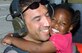 A heartwarming moment depicting the profession of Air Force pararescue which had a prominent role in rescuing victims from the aftermath of Hurricane Katrina 11 years ago. The little girl in a pink shirt and pigtails flung her arms around the neck of Master Sgt. Mike Maroney, pararescueman, who hoisted her from the flooded ruins of her family's New Orleans home. The photo was a positive iconic memento during a dark time, for not only the hurricane victims, but for Maroney who had just returned from an overseas deployment to Afghanistan, before being sent to respond to hurricane victims. (U.S. Air Force photo/Airman 1st Class Veronica Pierce)
