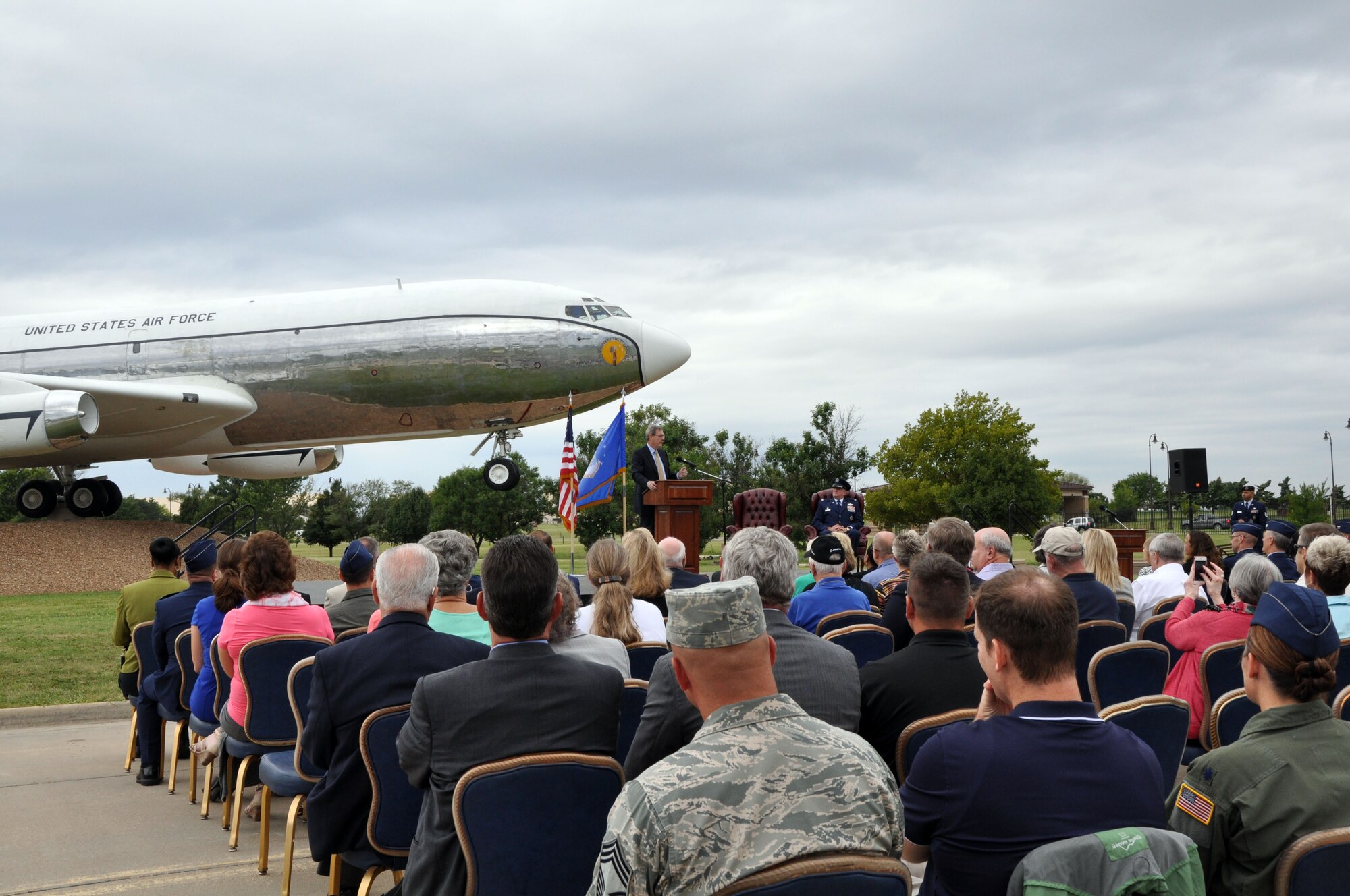 More than 250 people gathered 60 years later to celebrate the KC-135 as it reached its diamond anniversary, Aug. 31, at the McConnell Air Park. During the ceremony, members of Team McConnell, the local community and the tanker community listen to Gen. Stephen R. Lorenz, retired Air Education Training Command commander and KC-135 pilot, speak during the KC-135 60th Anniversary Ceremony, Aug. 31, 2016, at McConnell Air Force Base, Kan. Lorenz spoke about the history of aerial refueling and the pivotal role the KC-135 has had in projecting airpower during the last 60 years. (U.S. Air Force photo by Tech. Sgt. Abigail Klein)
