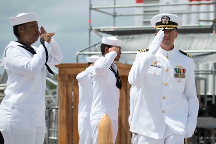 160830-N-LY160-198 JOINT BASE PEARL HARBOR-HICKAM, Hawaii (August 30, 2016) Cmdr. Chad Hardt, commanding officer of the Los Angeles-class fast-attack submarine USS Tucson (SSN 770), is piped ashore at the conclusion of the change of command ceremony in Joint Base Pearl Harbor-Hickam. Hardt relieves Cmdr. Michael Beckette as the 10th commanding officer of the USS Tucson. (U.S. Navy photo by Mass Communication Specialist 2nd Class Michael H. Lee)