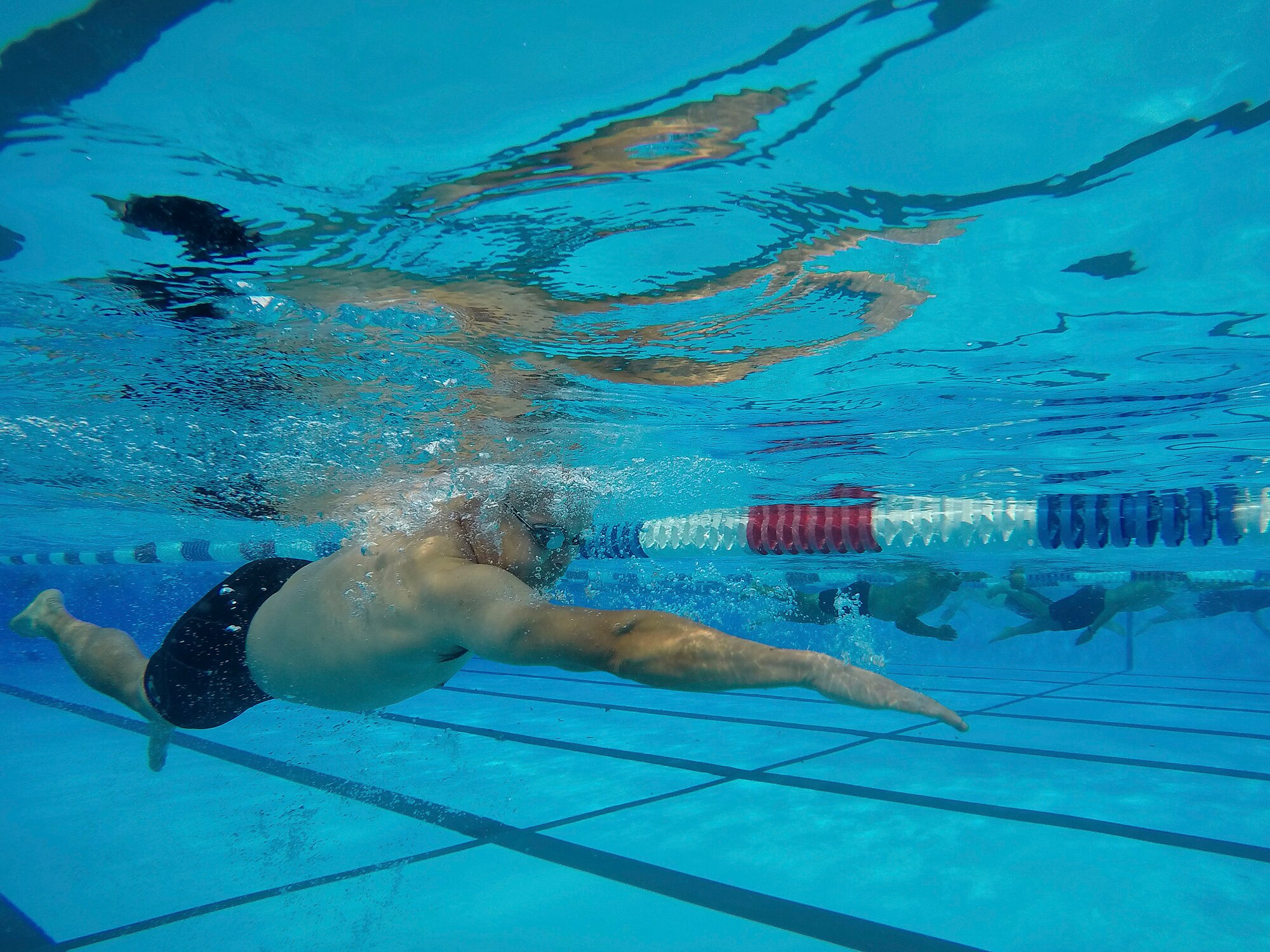 A Team Scott member participates in the swim portion of the Surface Warrior Challenge at Scott Air Force Base, Ill., Aug. 27, 2016. The triathlon was hosted by the Military Surface Deployment and Distribution Command and featured both a full and miniature triathlon which included running, bicycling and swimming. (U.S. Air Force photo by Tech. Sgt. Jonathan Fowler)