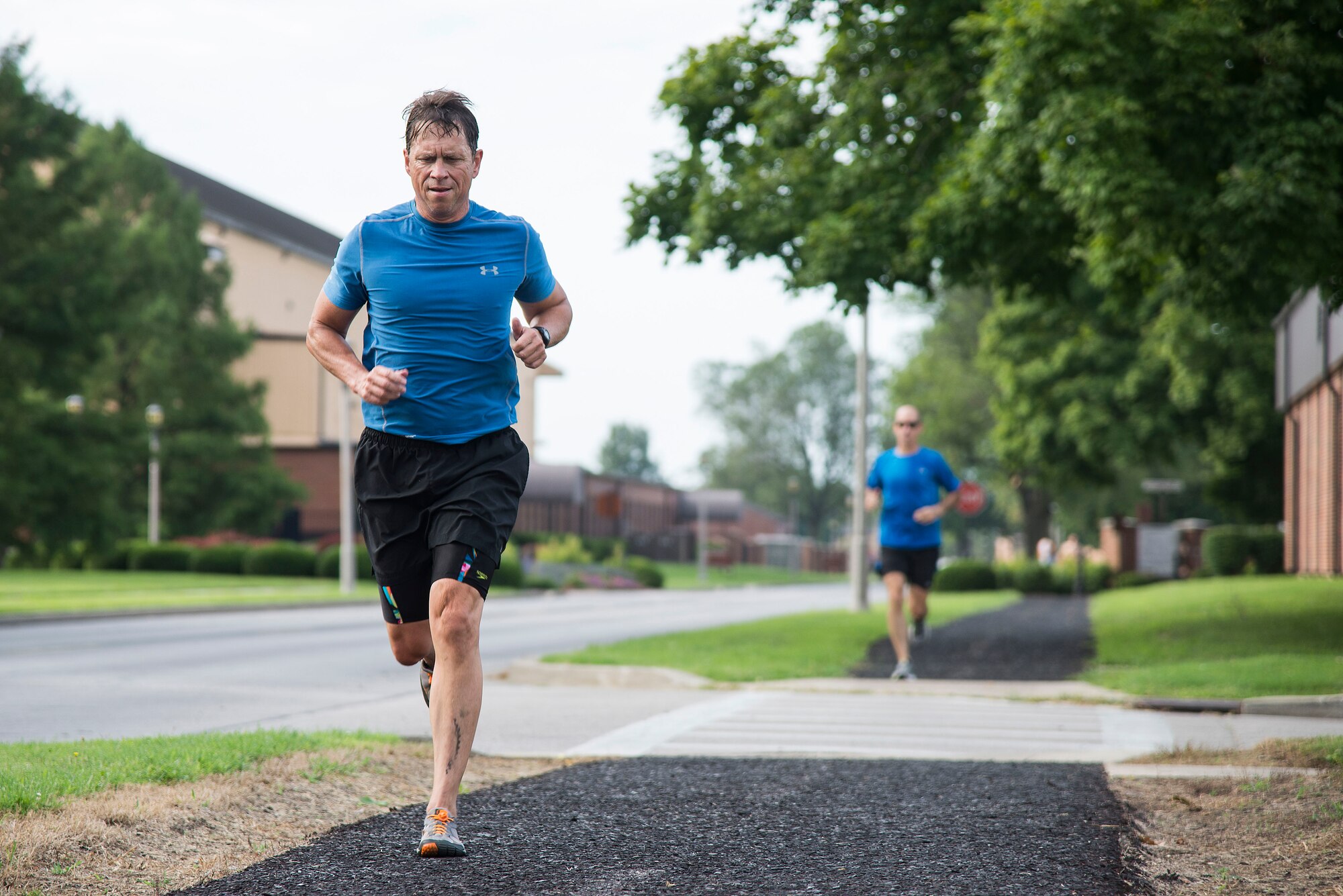 Runners compete in the Surface Warrior Challenge at Scott Air Force Base, Ill., Aug. 27, 2016. The triathlon was hosted by the Military Surface Deployment and Distribution Command and featured both a full and miniature triathlon which included running, bicycling and swimming. (U.S. Air Force photo by Tech. Sgt. Jonathan Fowler)