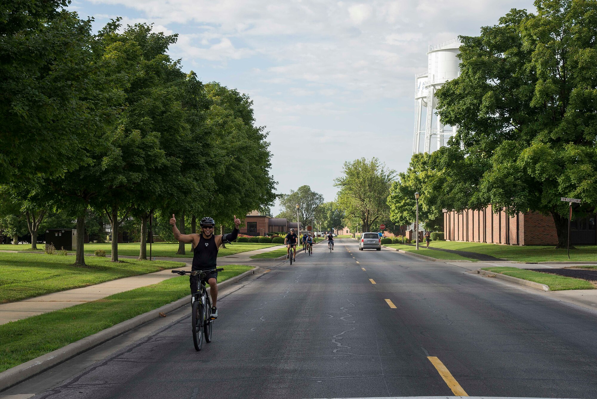 Bicyclists compete in the Surface Warrior Challenge at Scott Air Force Base, Ill., Aug. 27, 2016. The triathlon allowed participants to compete both individually and as teams. Additionally, participants could choose between the full triathlon and a miniature one that shortened the distance each portion of the race required. (U.S. Air Force photo by Tech. Sgt. Jonathan Fowler)