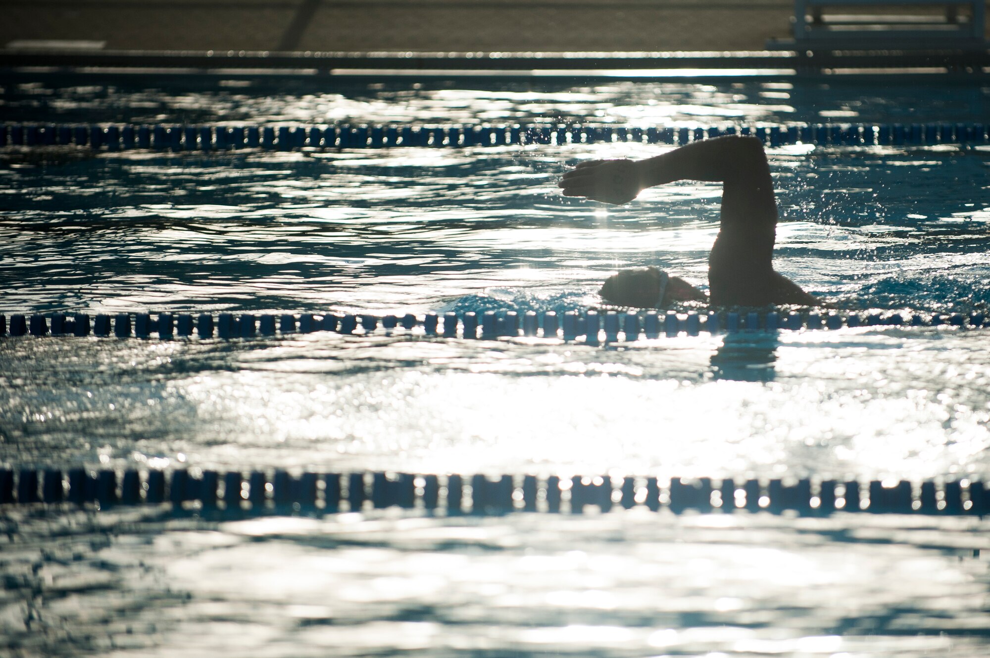 A Team Scott member participates in the swim portion of the Surface Warrior Challenge at Scott Air Force Base, Ill., Aug. 27, 2016. Each portion of the triathlon featured a full and miniature competition. For the swim portion, participants completed a 100 meter or 500 meter swim. (U.S. Air Force photo by Staff Sgt. Clayton Lenhardt/Released)