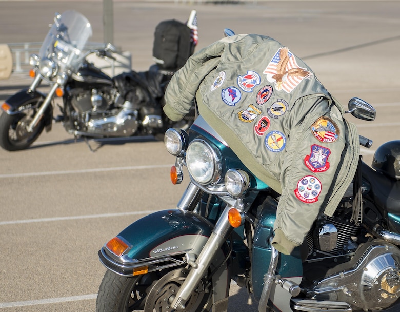 A jacket draped over a motorcycle bears patches from numerous Air Force squadrons Aug. 26, 2016 at Holloman Air Force Base, N.M. The 49th Wing Safety office hosts a ride every year to promote safe habits and improve riders’ skills. (U.S. Air Force photo by Airman 1st Class Randahl J. Jenson) 