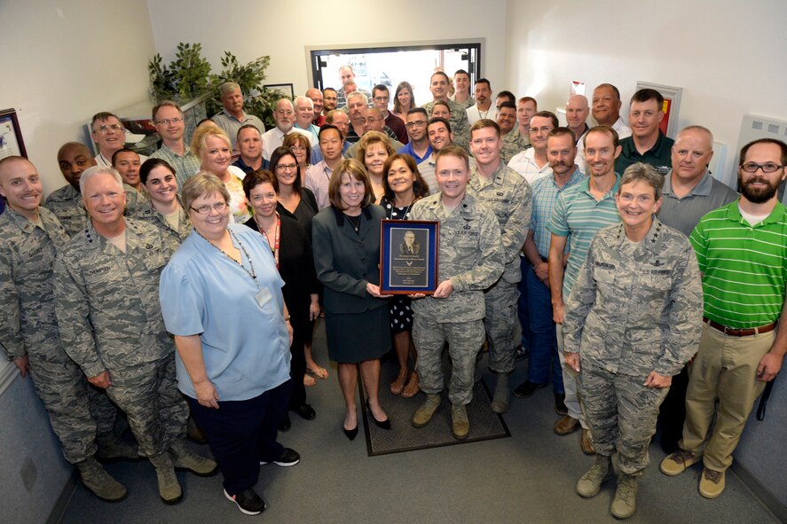 The A-10 System Program Office team receives the 2015 Dr. James G. Roche Sustainment Excellence Award Aug. 31 during a meeting of AFMC leaders at Hill AFB. The award is presented annually based upon objective criteria to the AFMC program office with the most improved performance in fleet sustainment during the given fiscal year, and is named after Dr. James Roche, a former U.S. Navy officer and the 20th Secretary of the Air Force. (U.S. Air Force photo by Todd Cromar)