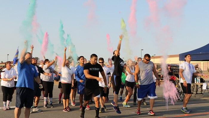 Members of Team March start the third annual color run in traditional fashion, here at March Air Reserve Base California.