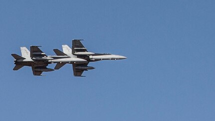 Two F/A-18C Hornets with Marine Fighter Attack Squadron (VMFA) 122 fly over head during Southern Frontier at Royal Australian Air Force Base Tindal, Australia, Aug. 31, 2016. The Hornet squadron trained in low-altitude tactics, building pilots’ confidence and skills with low flying while performing air-to-surface maneuvers simultaneously. Southern Frontier is a three week unit level training helping pilots gain experience and qualifications in low-altitude tactics, close air support, and air ground, high explosive ordnance delivery. 