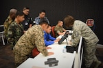 Master Sgt. Rachel Taylor, A Spectrum Manager at Defense Information Systems Agency's Joint Spectrum Center, briefs Participants of Exercise Pacific Endeavor 2016. Sponsored by U.S. Pacific Command and hosted by the Australian Defence Force, Aug. 28, 2016, Pacific Endeavor 2016 is a multinational workshop designed to enhance communication interoperability and expedite Humanitarian Assistance and Disaster Relief response in the Indo-Asia Pacific region. The workshop involved 250 participants from 22 allied and partner nations. 
