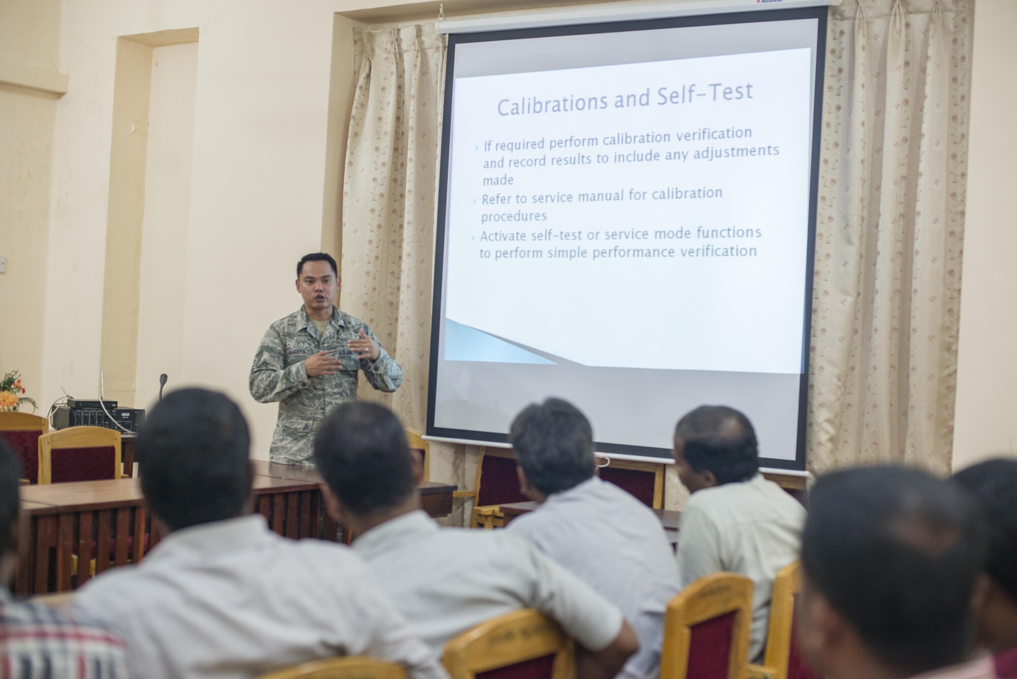 U.S. Air Force Tech. Sgt. Maison Babiera, 18th Medical Support Squadron medical maintenance non-commissioned officer in charge, teaches local medical professional about preventative medical equipment maintenance during Pacific Angel (PACANGEL) 16-3 in Jaffna, Sri Lanka, Aug. 14, 2016. PACANGEL is a total force, joint and combined humanitarian assistance/civil military operation led by U.S. Pacific Air Forces. Before PACANGEL started, the U.S. Air Force hosted multiple subject matter expert exchanges for crowd control, physical therapy, casualty evacuation simulations and biomedical equipment. (U.S. Air Force photo by Senior Airman Brittany A. Chase)