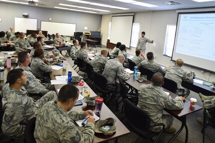 Joint Base Charleston’s newest Master Sergeant (select) Airmen review course material during a Senior Noncommissioned Officer Seminar at Joint Base Charleston, South Carolina, Aug. 17, 2016. The seminar was held to help prepare the selects join the ranks of the top enlisted tier of the Air Force. (U.S. Air Force photo by Airman 1st Class Kevin West/Released)