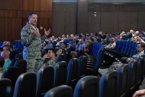 628th Airbase Wing commander Col. Robert Lyman speaks to Airmen during a commander’s call at Joint Base Charleston, South Carolina, Aug. 19, 2016. During the event, Airmen gave feedback and asked questions about current Air Force news. (U.S. Air Force photo by Staff Sgt. Andrea Salazar/Released)