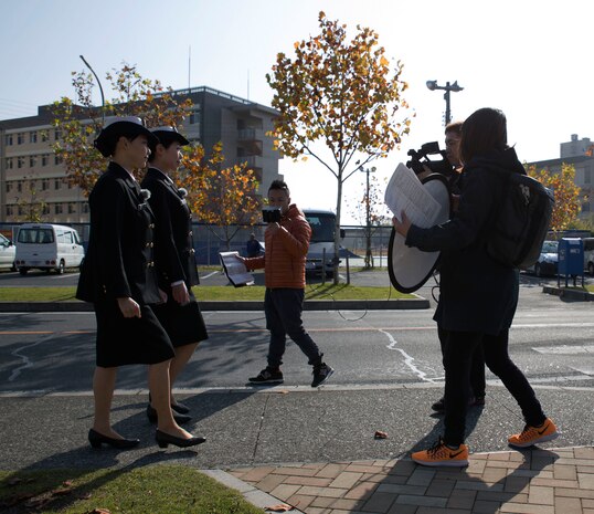 The Hakuhodo film team records a promotion video at Marine Corps Air Station Iwakuni, Japan, Nov. 29, 2016. Hakuhodo Inc. teamed up with the Japan Maritime Self-Defense Force to create a promotion video to show how the JMSDF is active in the community. (U.S. Marine Corps photo by Pfc. Gabriela Garcia-Herrera)