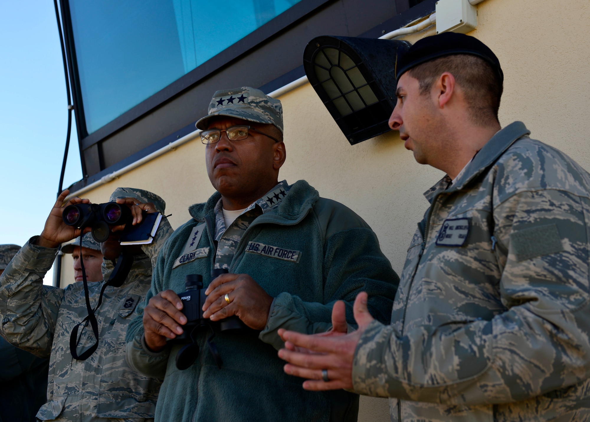 Master Sgt. William Hinchcliff, 31st Security Forces flight chief, talks to Lt. Gen. Richard Clark, 3rd Air Force commander, during a security forces demonstration at Aviano Air Base, Italy on Nov. 30, 2016. Clark toured the base, met with Airmen and hosted an all call to thank Team Aviano for their hard work and dedication to the mission. (U.S. Air Force photo by Senior Airman Cary Smith)