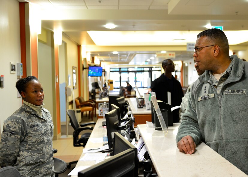 Lt. Gen. Richard Clark, 3rd Air Force commander, speaks with Airman 1st Class Brittany Duncan, 31st Medical Operations Squadron patient administrator, during his visit to Aviano Air Base, Italy on Nov. 30, 2016. Clark toured the base, met with Airmen and hosted an all call to thank Team Aviano for their hard work and dedication to the mission. (U.S. Air Force photo by Senior Airman Cary Smith)