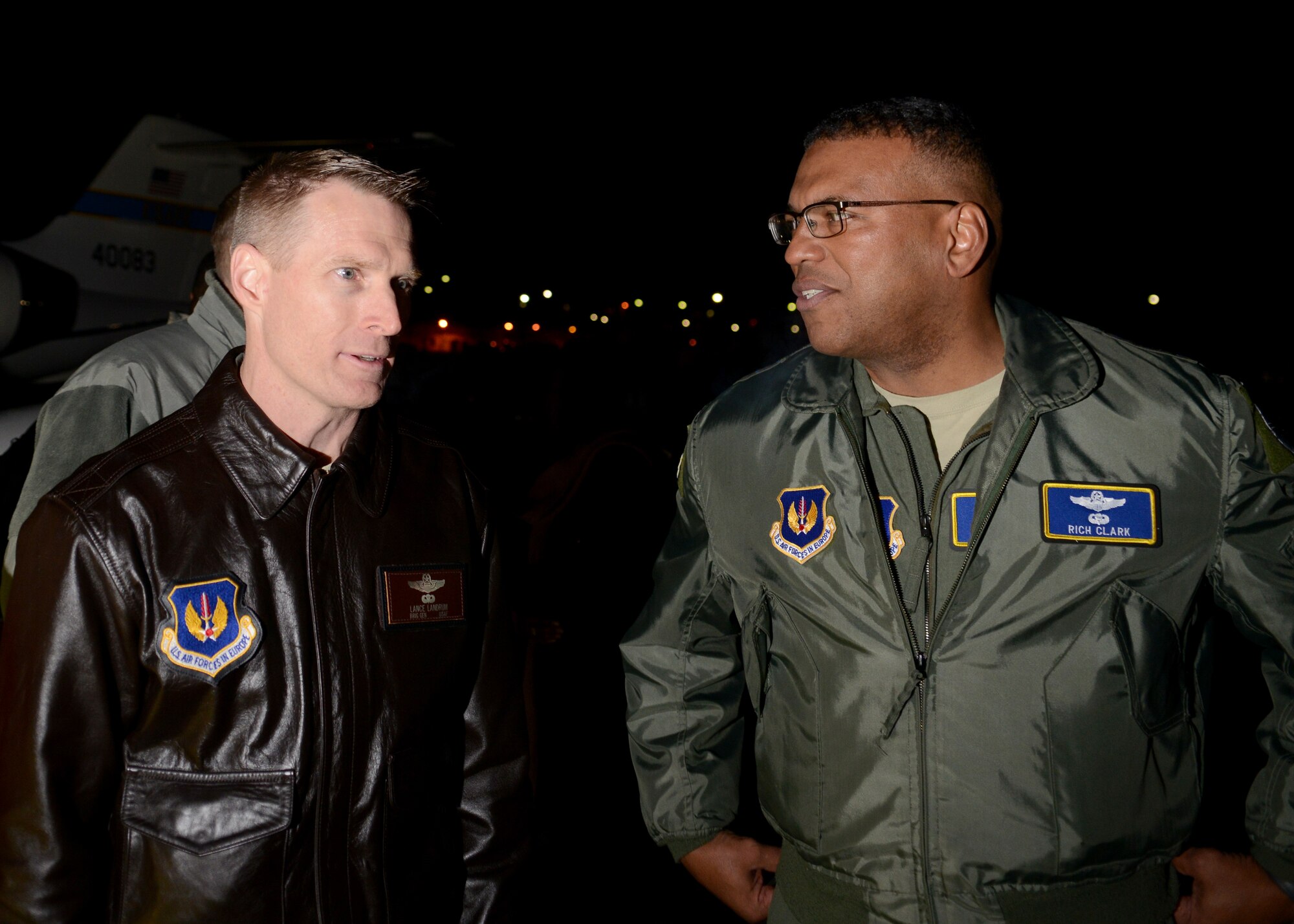 Brig. Gen. Lance Landrum, 31st Fighter Wing commander, meets Lt. Gen. Richard Clark, 3rd Air Force commander, during his arrival to Aviano Air Base, Italy on Nov. 29, 2016. Clark toured the base, met with Airmen and hosted an all call to thank Team Aviano for their hard work and dedication to the mission. (U.S. Air Force photo by Senior Airman Austin Harvill)