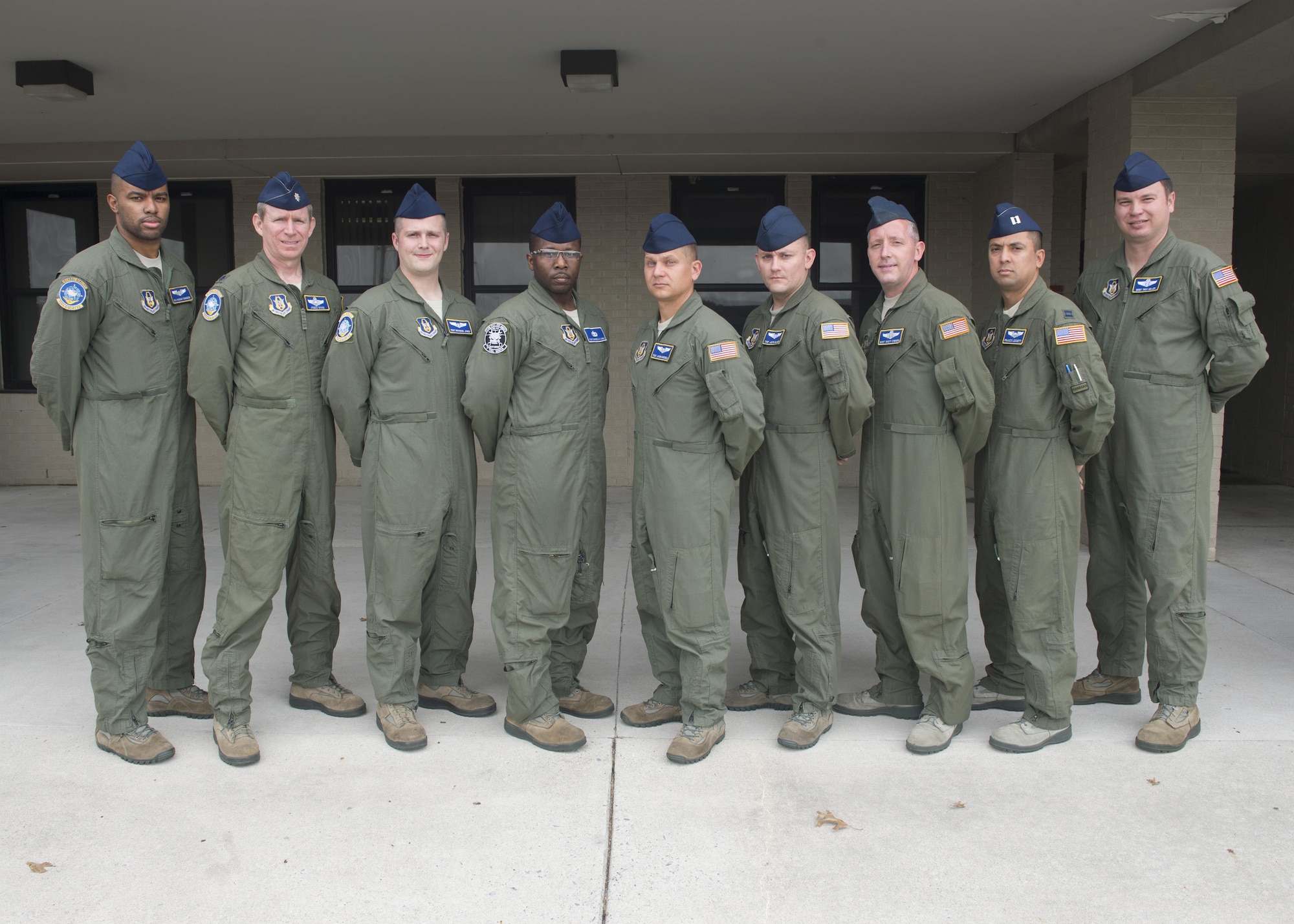 (Left to right) Senior Airman Vasean Townsend, Lt. Col. James Mann, Tech, Sgt. Brandon Jones, Tech. Sgt. Marcello Lindo, Tech. Sgt. Jason Goodsell, Tech. Sgt. Justin Walker, Master Sgt. Scott O’Brien, Capt. Francis Lessett and Master Sgt. Troy Heller, 512th Airlift Wing, are members of the 12-person crew who won the Air Force Reserve Command Aircrew of Distinction Award. Not pictured are Maj. Blain Brown, Master Sgt. Broderick Williams and Senior Airman Rebecca Lehotay (U.S. Air Force Photo/Tech. Sgt. Nathan Rivard)